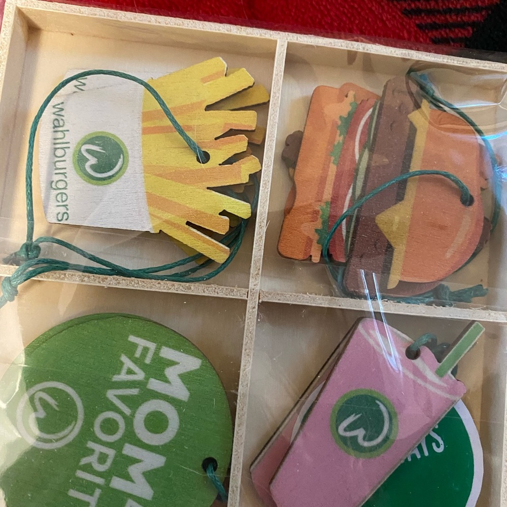 Whataburger gear and Christmas ornaments and pins